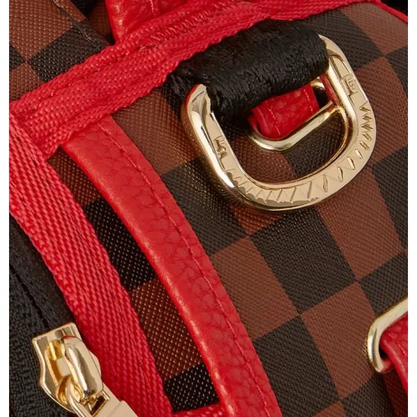 Mochila Sprayground Takeover The Throne detalle herraje