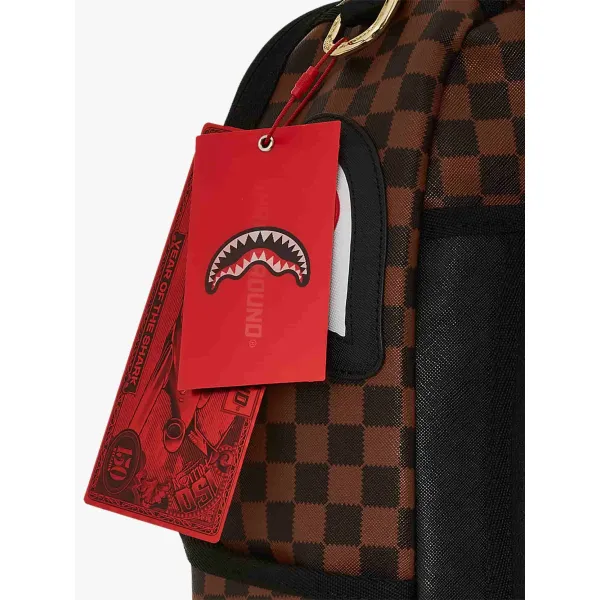 Sprayground Shark in Paris Sawtooth marron etiqueta