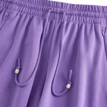 Pantalón corto Anta Knit Game morado cintura