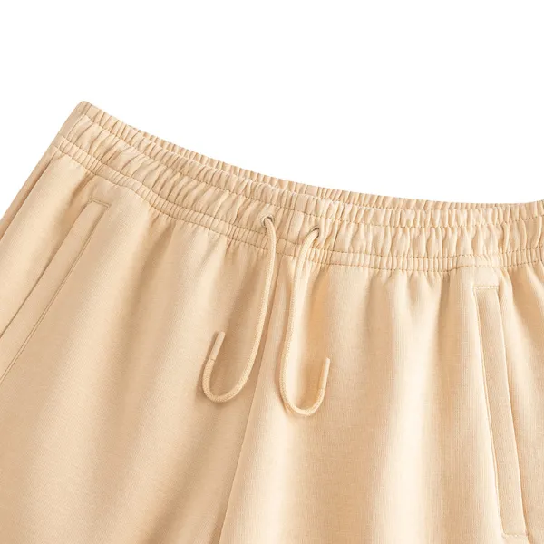 Anta KAI beige pantalon largo foto detalle 1