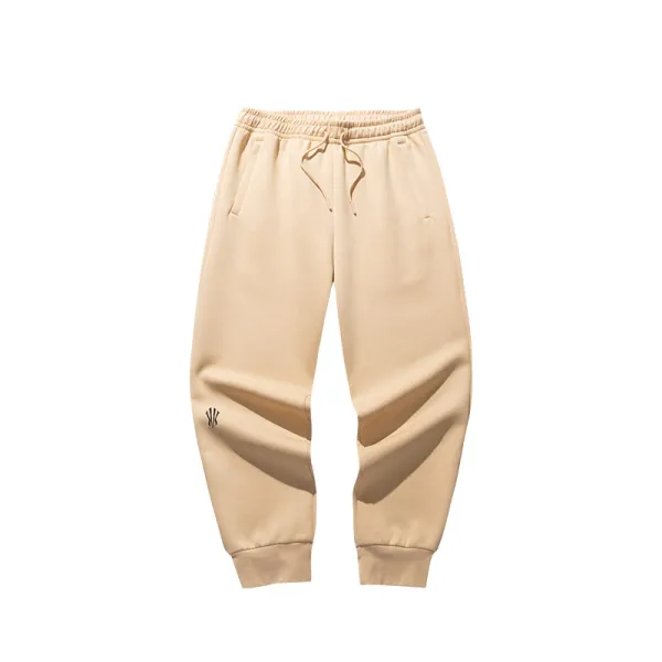 Anta KAI beige pantalon largo foto frontal
