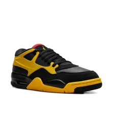 Zapatillas Air Jordan 4 RM Bruce Lee en amarillo y negro, vista frontal