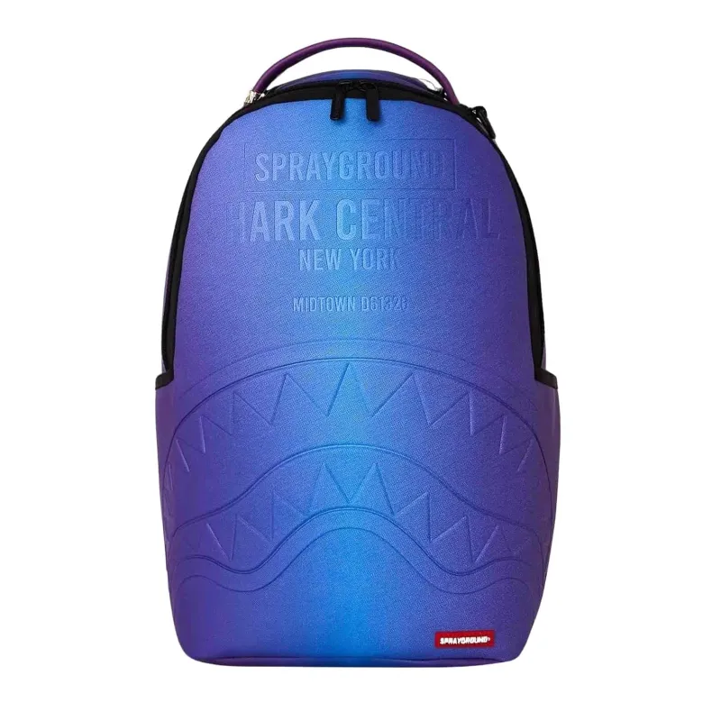 Mochila Sprayground Shark Central Embossed Dusk B9627 azul y violeta con boca de tiburón en relieve - frontal