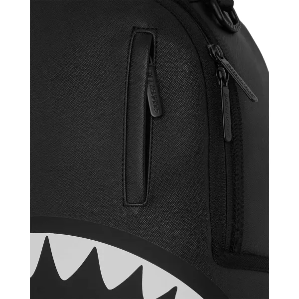 Mochila Mini Sprayground Black Toon Shark M9567 negra con boca de tiburón blanca y roja