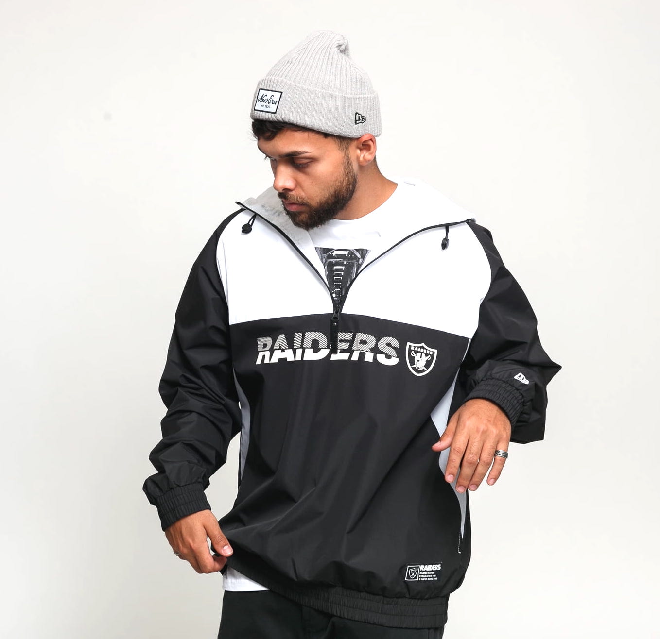 chaqueta cortavientos New Era Raiders